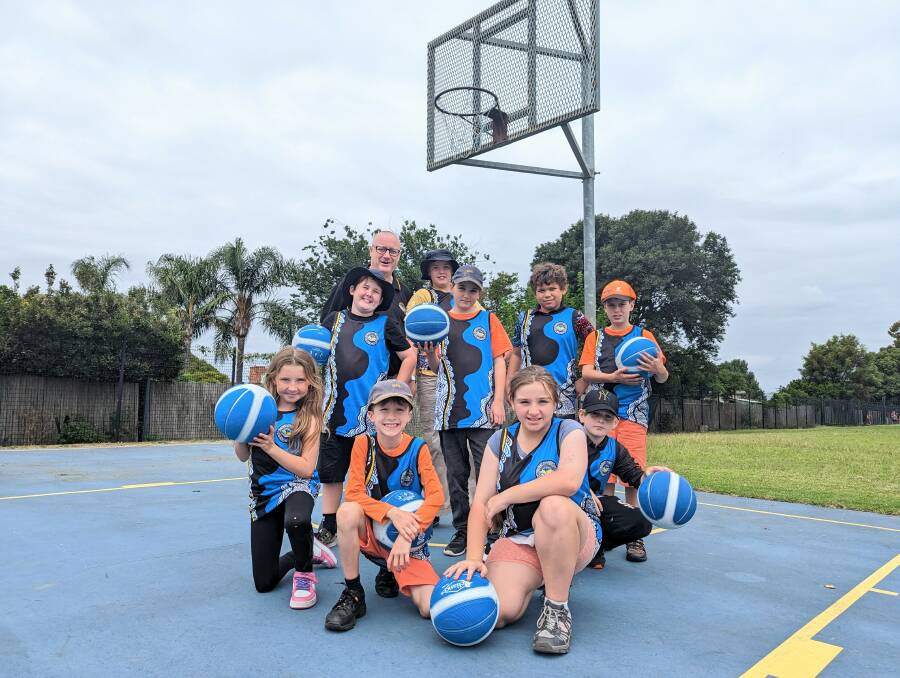 Program Designer Scott Balsar (back) with Bomaderry Public School students who have signed up for the Ballers Program next term. Picture by Sam Baker 