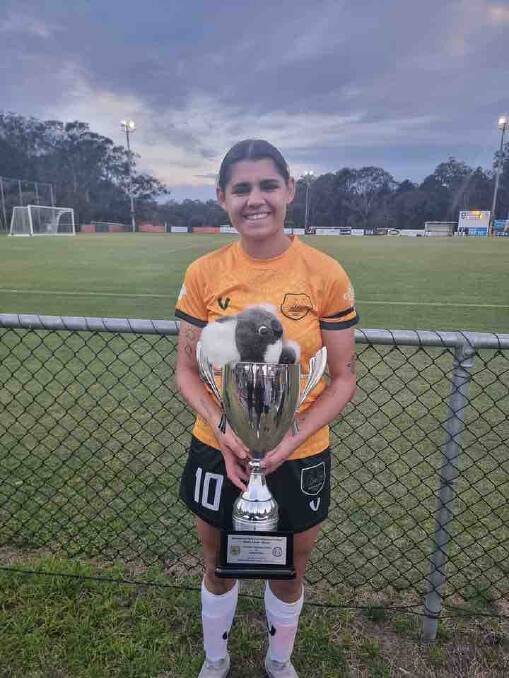 Shoalhaven FC's Shaylee Meehan with her player of the match trophy for trial match one. Picture supplied. 