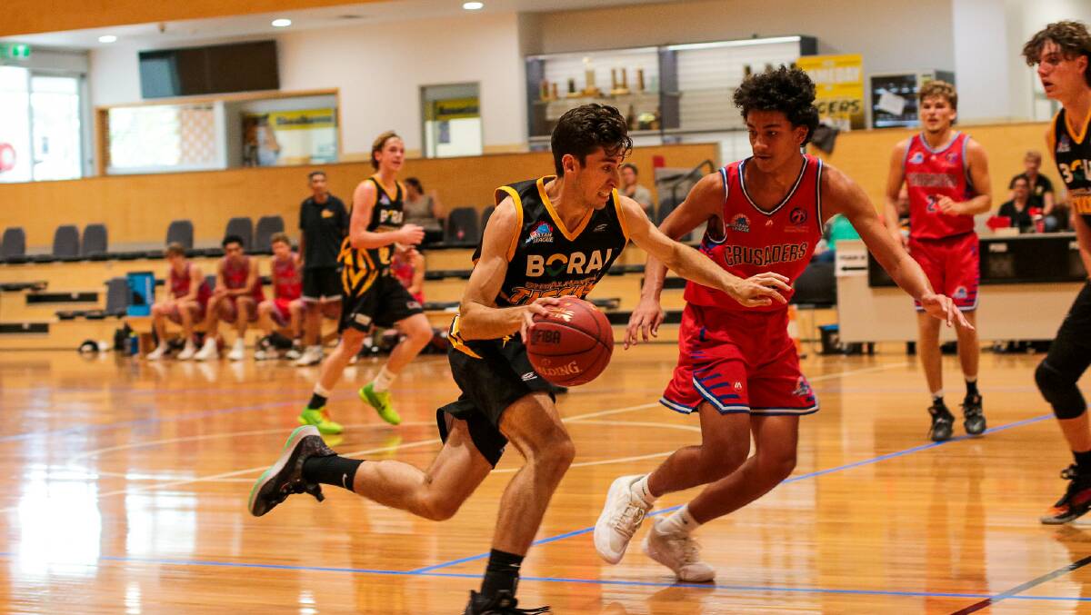 Mitch Falcke attacking the basket against the Central Coast Crusaders. Picture by Greg Turner.