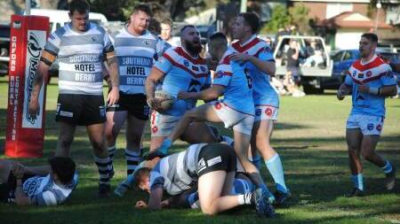 Milton-Ulladulla Bulldogs celebrating a try against the Berry-Shoalhaven Heads Magpies last season. Picture by Damian McGill