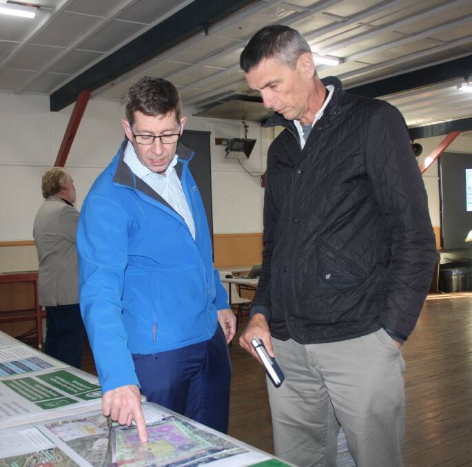 Innovating Energy general manager Simon Kelly talks Shoalhaven City Councillor Evan Christen through some of the aspects of the planned work at Terara. Picture by Glenn Ellard.