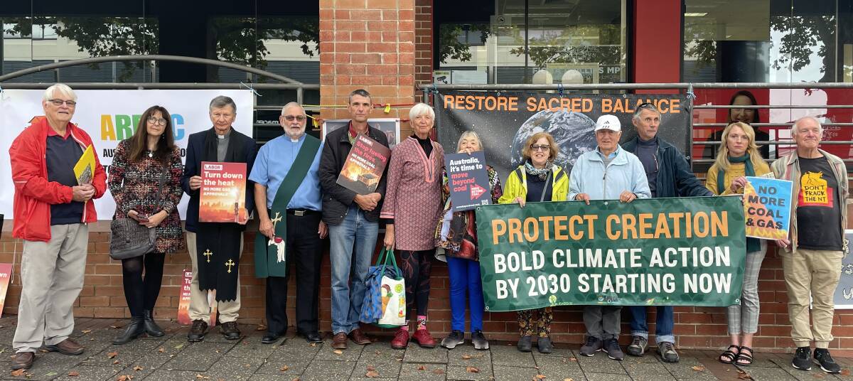 Climate activists and religious groups recently protested outside the office of Federal Member for Gilmore, Fiona Phillips. Photo supplied.