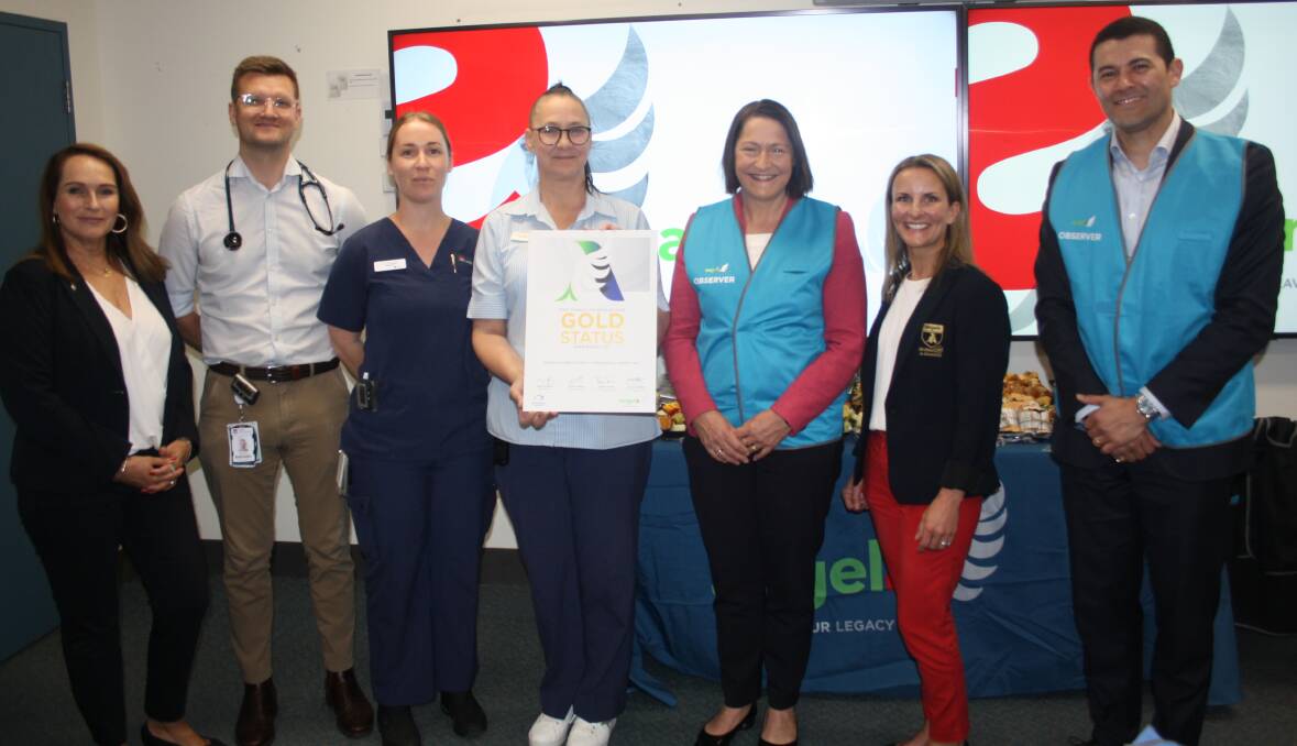 Federal Member for Gilmore, Fiona Phillips. presents the latest World Stroke Organisation Angels gold award to staff at Shoalhaven Hospital's stroke unit. Picture by Glenn Ellard.