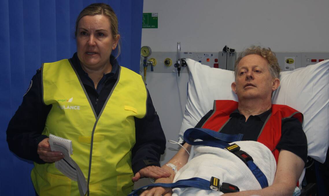 Paramedic Gayle Harvey describes symptoms and initial treatment given to the demonstration's stroke patient, referred to only as John Doe. Picture by Glenn Ellard.