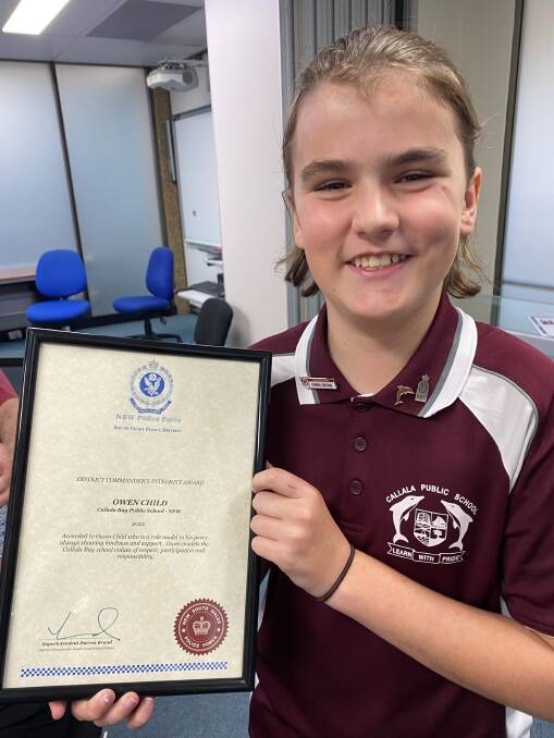 Callala Public School year 6 student Own Child with his District Commander's Integrity Award. Picture by Glenn Ellard.