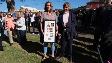 Emily Williams (daughter) and Geraldine Page (wife) remembered their late veteran father and husband at the Bomaderry ANZAC Day service. Picture by Holly McGuinness