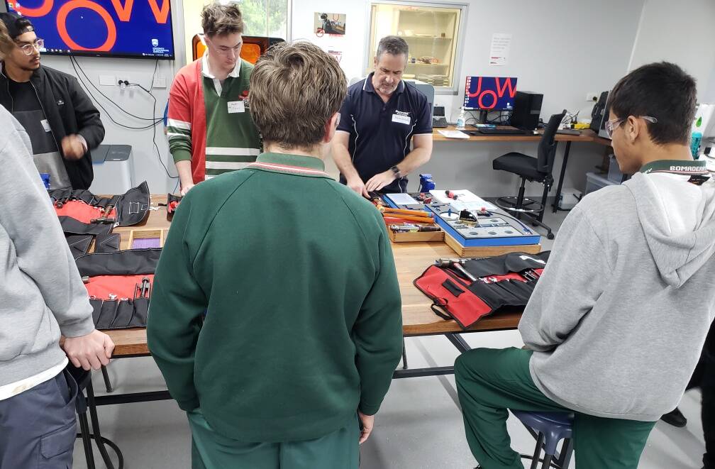 Pennant training instructors lead Bomaderry High School students in the Illawarra Shoalhaven Regional Defence Network Aircraft Maintenance Engineering Attraction Program during National Careers Week at Industry Hub 4.0 on the UOW Shoalhaven campus. Picture supplied