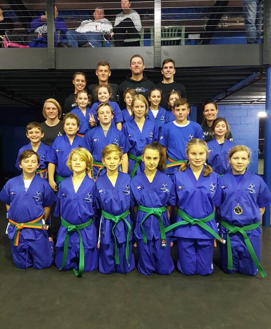 TOUGH CUSTOMERS: Southern Fitness and Martial Arts Centre Bomaderry's JKD green belts after their recent grading.