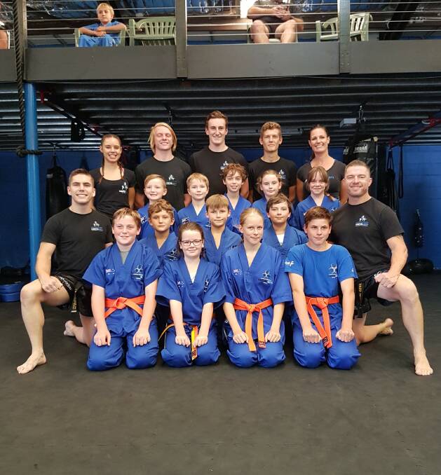 FAST LEARNERS: Bomaderry's Southern Fitness and Martial Arts Centres' junior kick defence yellow and orange belts, after their gradings.