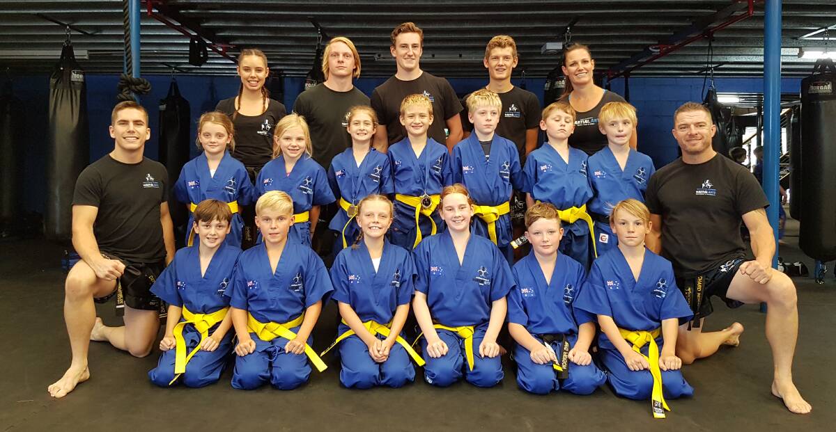 STARS OF THE SPORT: Bomaderry's Southern Fitness and Martial Arts Centres' white belt junior kick defence, after completing their recent gradings.
