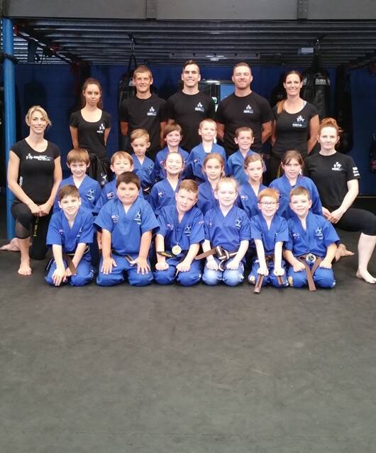 YOUNG STARS: Southern Fitness and Martial Arts Centres Bomaderry's Advanced Little Ninjas with their coaches after the recent gradings.