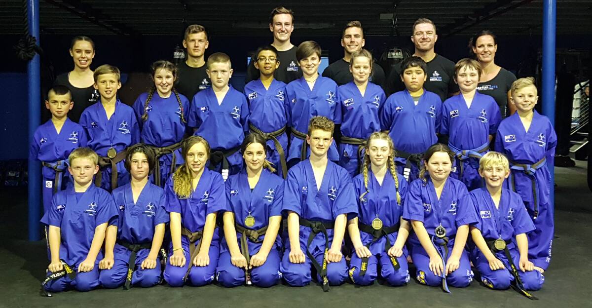 TOP OF THEIR CLASS: Southern Fitness, Martial Arts and CrossFit Centre Bomaderry's advanced junior kick defence after their term three gradings.