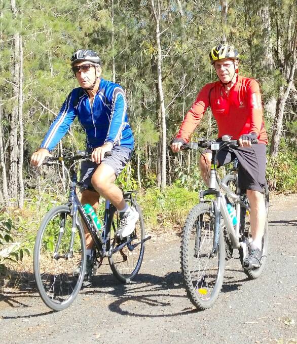 Dynamic duo: John Van Duin and Barry Cruwys on a recent Huskisson to Vincentia ride.
