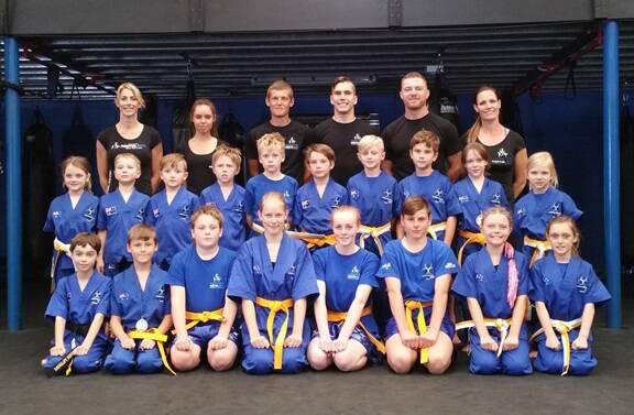 IMPROVING THEMSELVES: Southern Fitness and Martial Arts Centres Bomaderry's White Tip and Yellow Belt Junior Kick Defence.