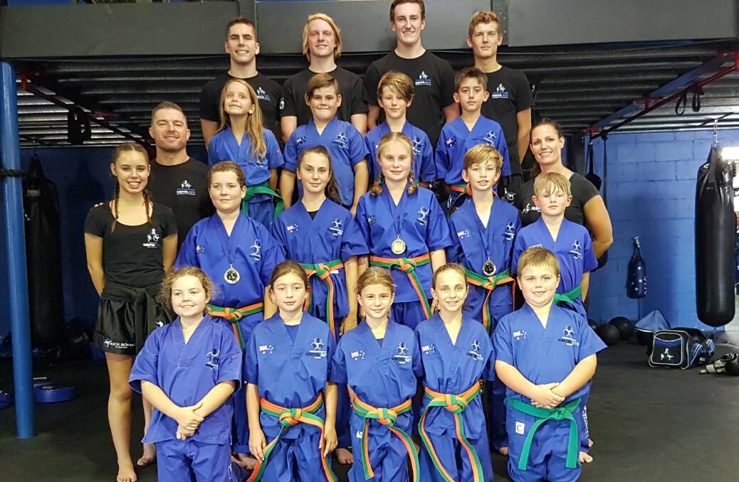 TOP OF THEIR CLASS: Bomaderry's Southern Fitness and Martial Arts Centres' junior kick defence orange and green belts.