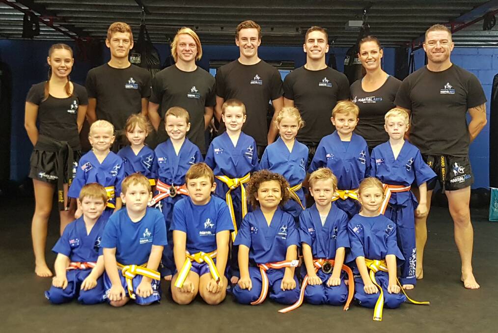 BIG FUTURES AHEAD: Bomaderry's Southern Fitness and Martial Arts Centres' white and yellow belt ninjas, after completing their recent gradings.