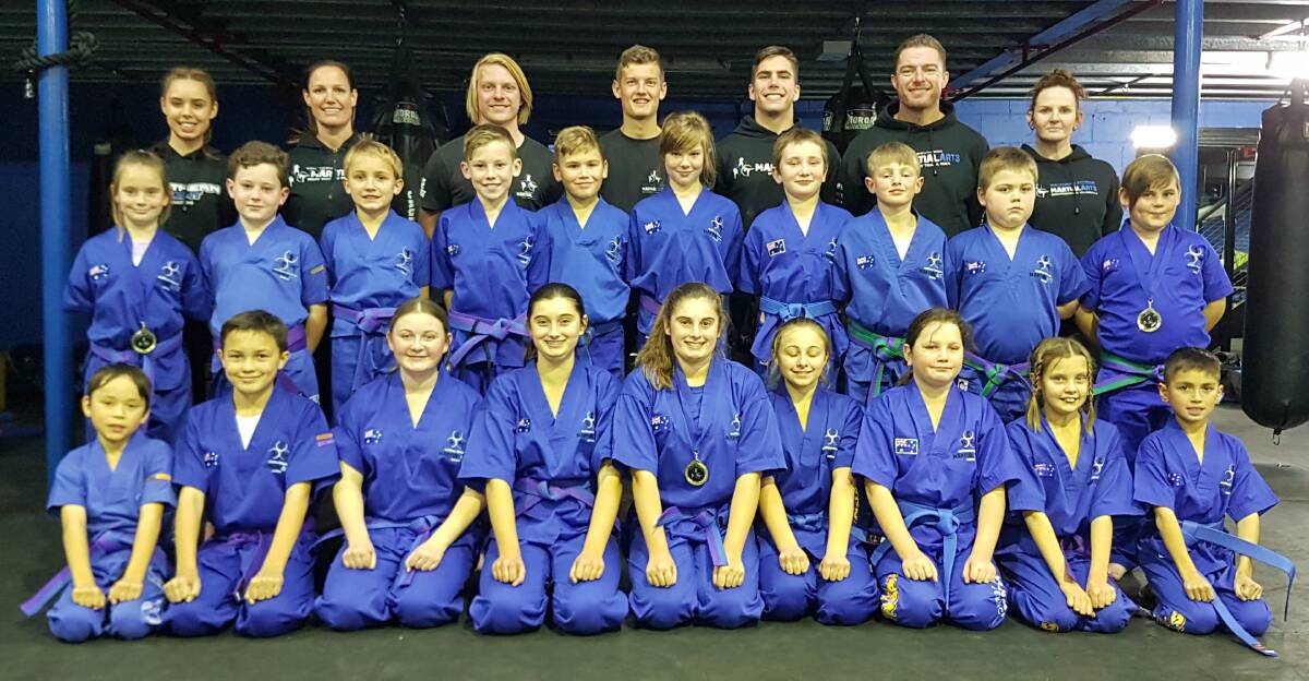 HARD WORK PAYS OFF: Southern Fitness and Martial Arts Centre Bomaderry's JKD blue belts following their term two gradings.