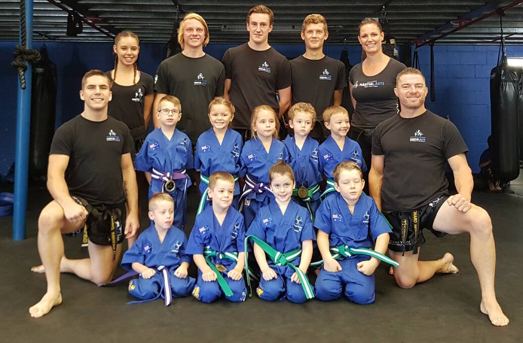 TOUGH CUSTOMERS: Bomaderry's Southern Fitness and Martial Arts Centres' orange and green belt ninjas.