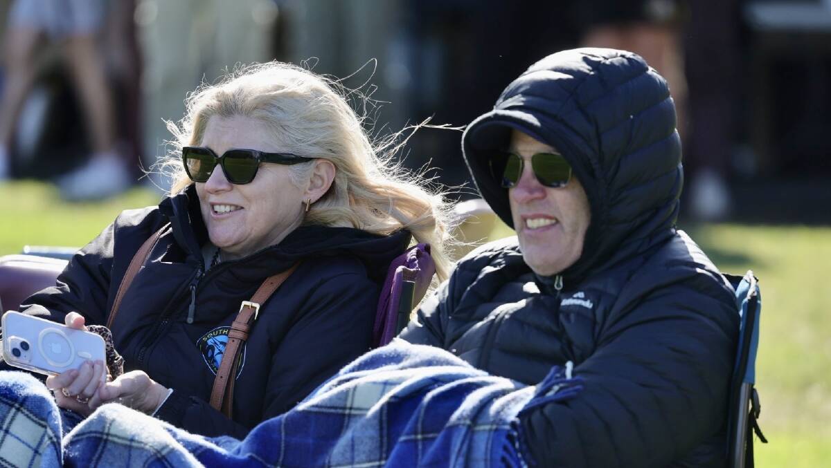 Michelle Blanch and Donovan Blanch watching their daughter playing her first game
AFL, the Tigers against Kiama, at Hollymount Park. Picture by Sylvia Liber