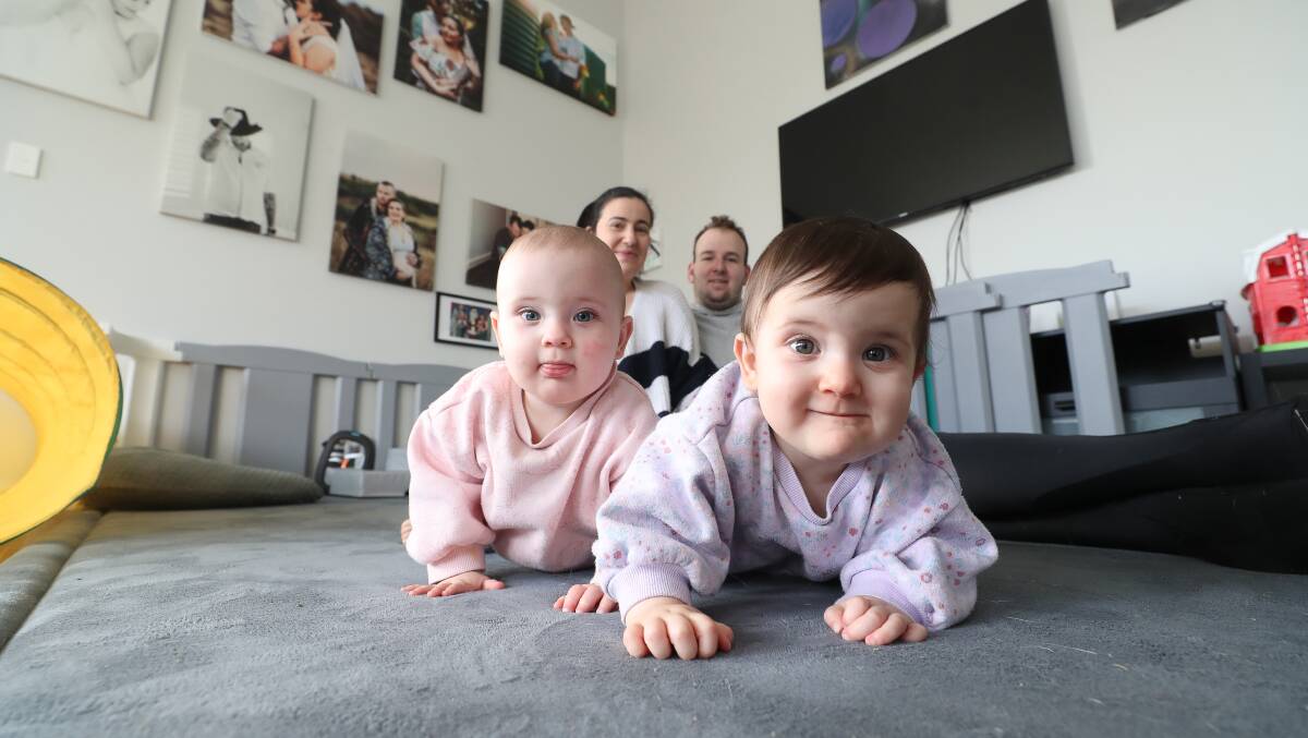 Hayden and Maddi Granger with their twin daughters Lily and Violet. Picture by Robert Peet