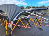 The damaged and broken awning in the car park at Woolworths Stoney Range in Shellharbour on Wednesday, July 3, 2024. Picture by Darren Malone