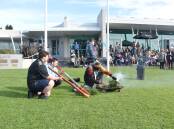 Riley Nolan and Murramarang man Jayden Perry play the Didgeridoo alongside Uncle Vic Channell.
