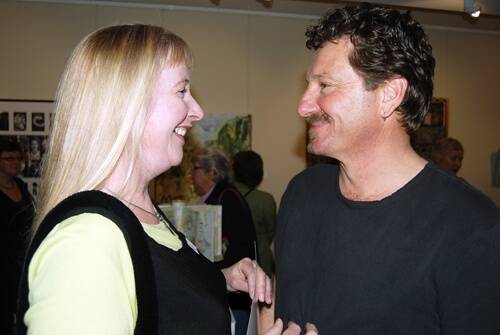 PROUD MOMENT: Anna Glynn is congratulated by her husband Peter Dalmazzo on the announcement of being the first prize winner in the 2009 Meroogal Womens’ Art Prize.