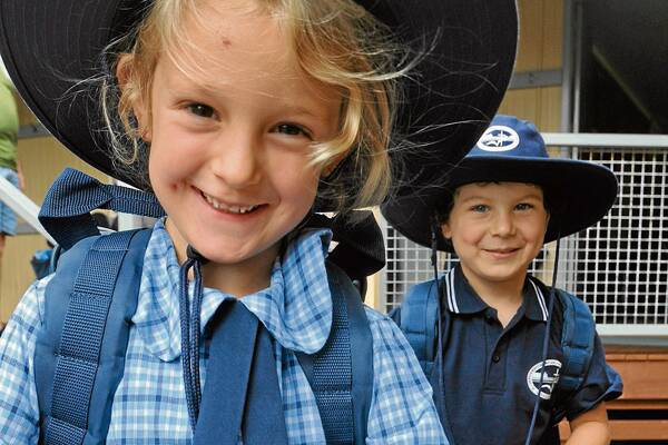 TIME FOR FRIENDS AND FUN: Jervis Bay Christian Community School kindergarten students Opal McDermott and Toby McDonell get to know each other during their first day at school.
