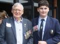 Colin Blundell was pictured with his grandson Nicholas Pavlis, who was wearing his great-grandfather's medals, following the service at St John The Evangelist Catholic High School. Picture by Glenn Ellard.